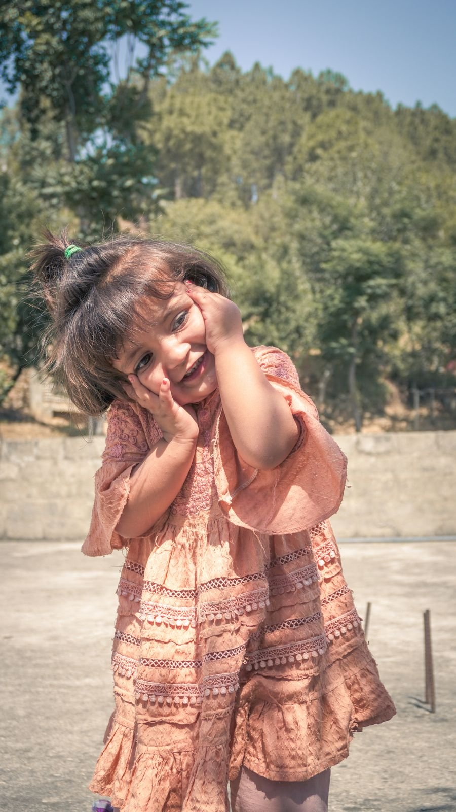 A happy child outdoors in Pakistan
