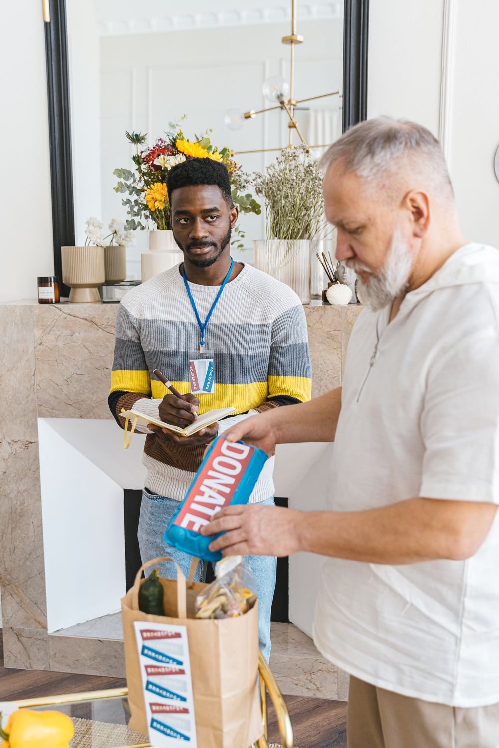 A volunteer handling a charity donation