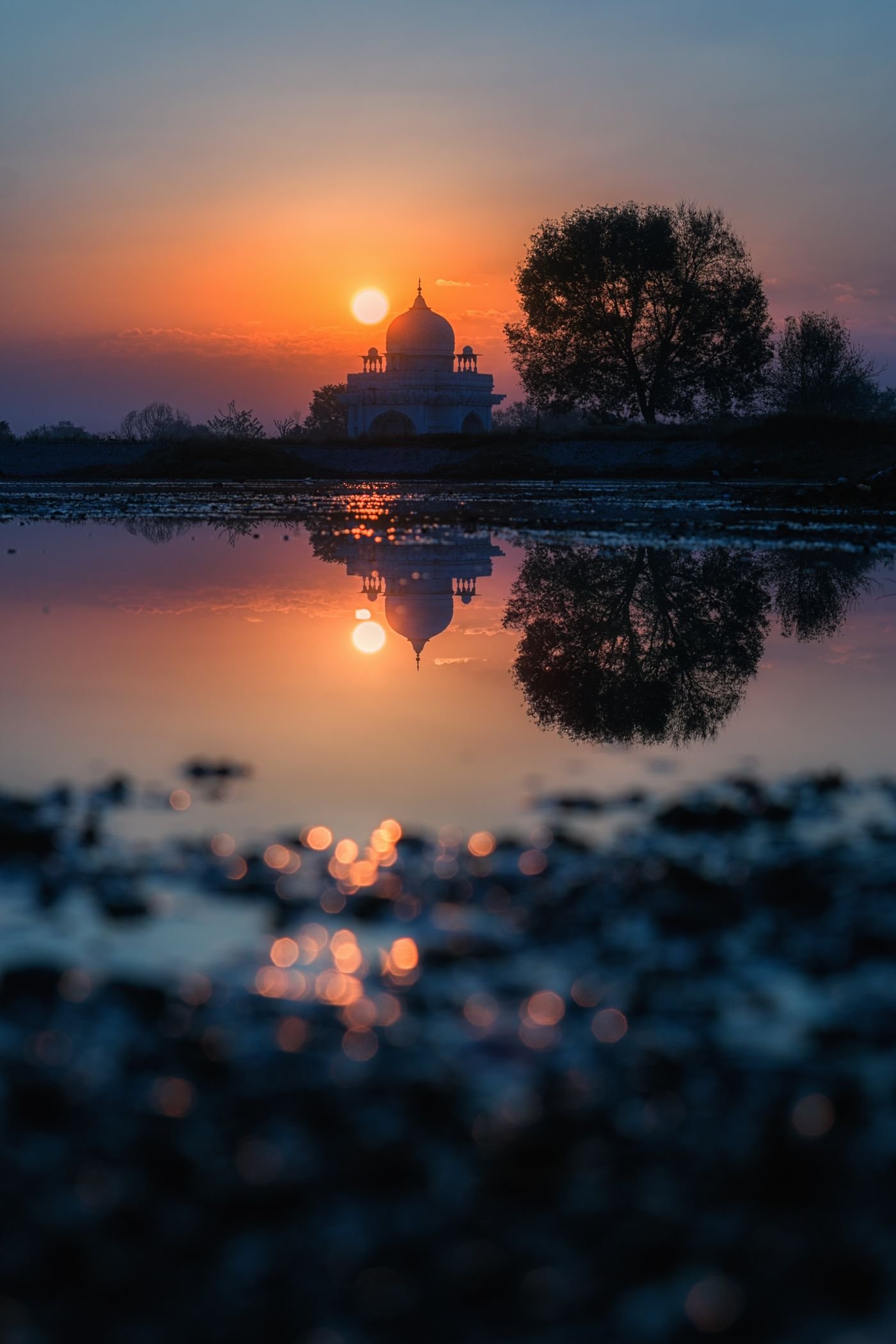 A mosque silhouette at sunset in Islamabad