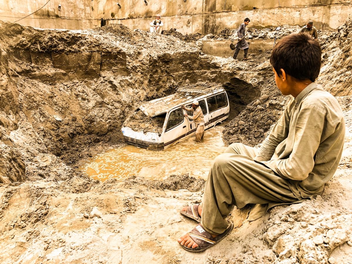 A child amid flood debris in Pakistan