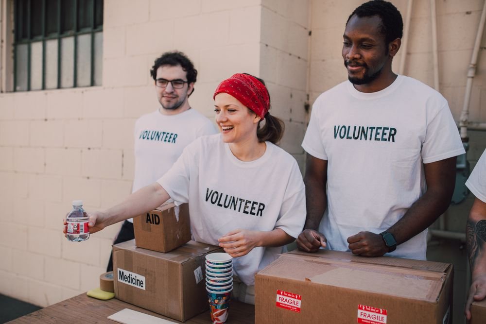 Volunteers distributing aid at a donation centre