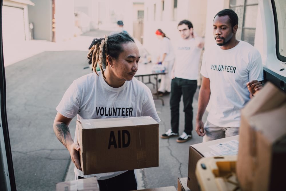 Volunteers unloading aid supplies